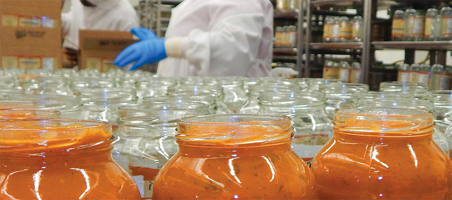 Food jars on production line